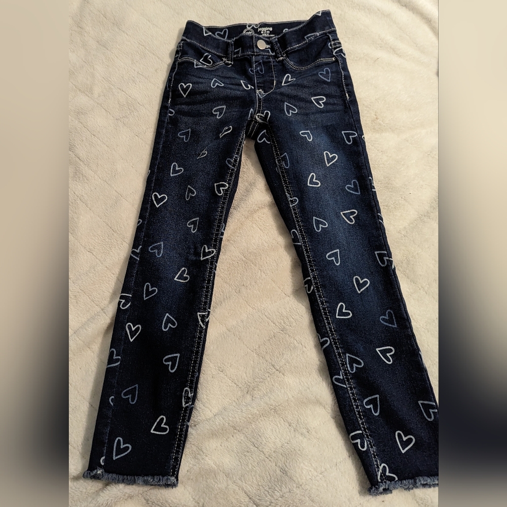 Girls size medium 7-8 Jeggings. Cute heart design. Good condition.